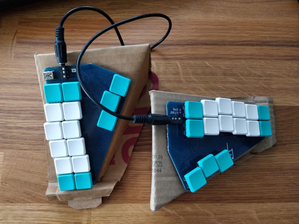 My steno keyboard, a Georgi with MBK Choc keys and a high-tech tenting base.
